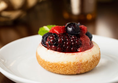 Cheesecake topped with fresh berries